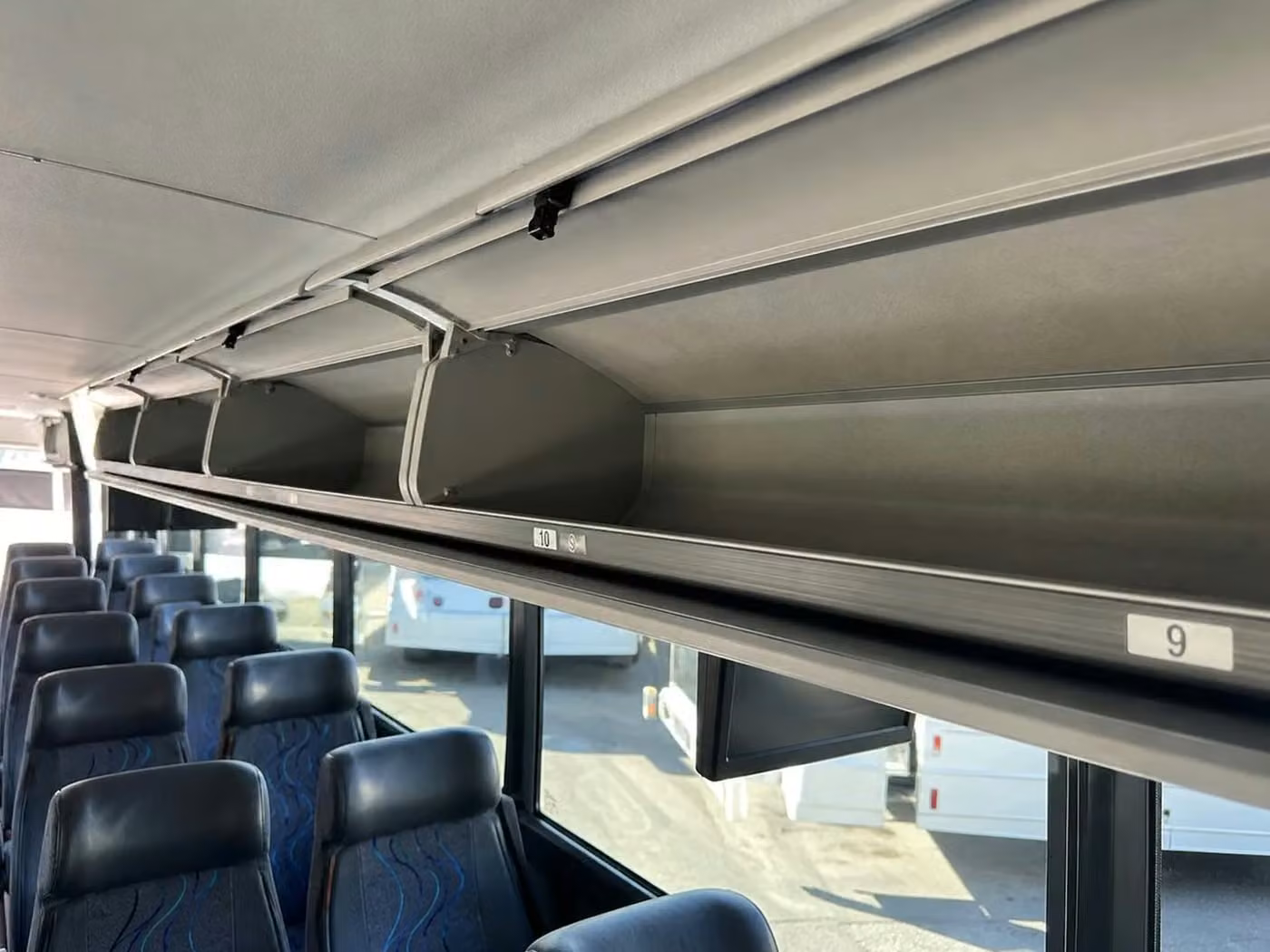 atwater 25 passenger minibus overhead storage