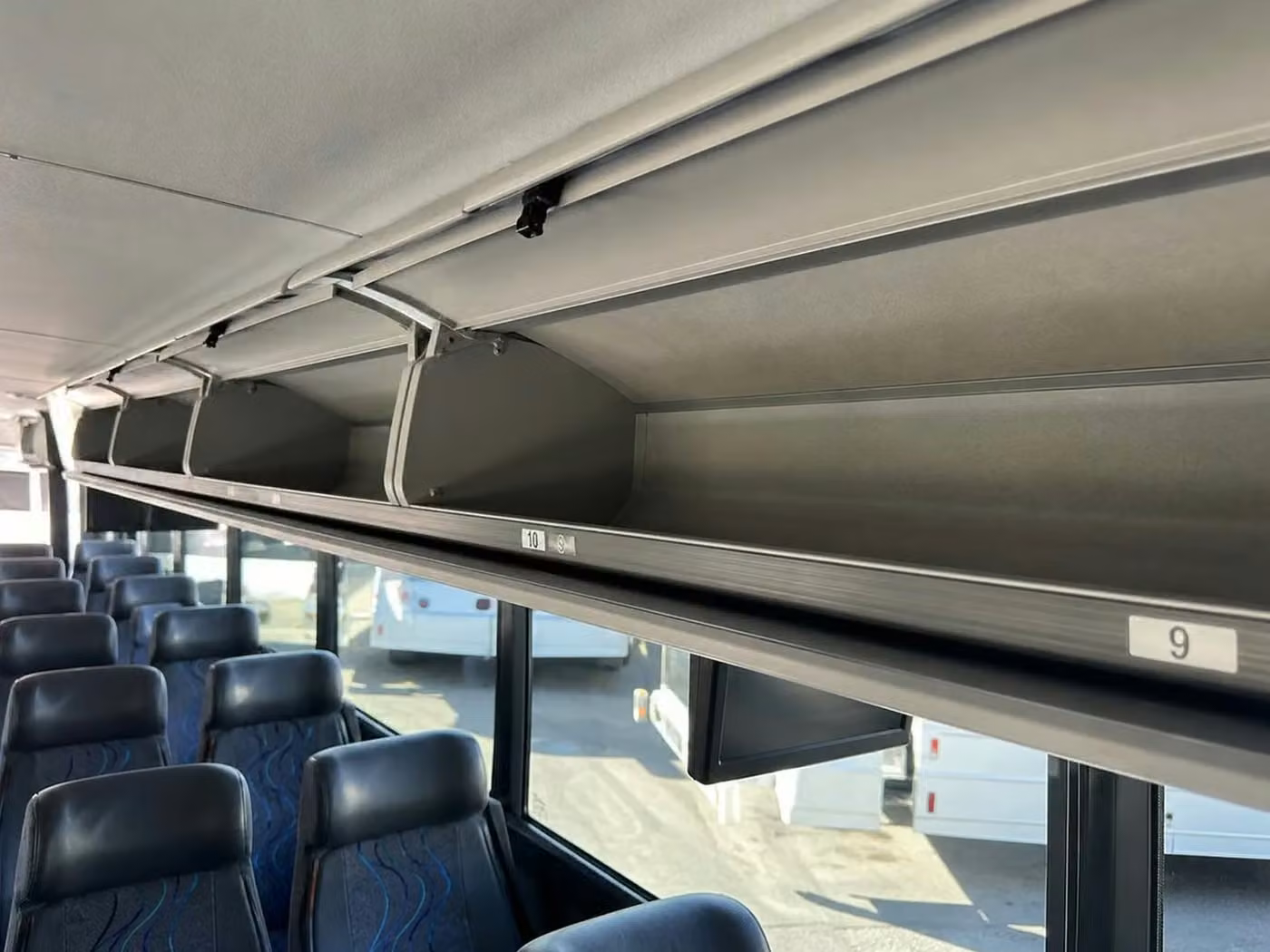atwater 28 passenger minibus overhead storage