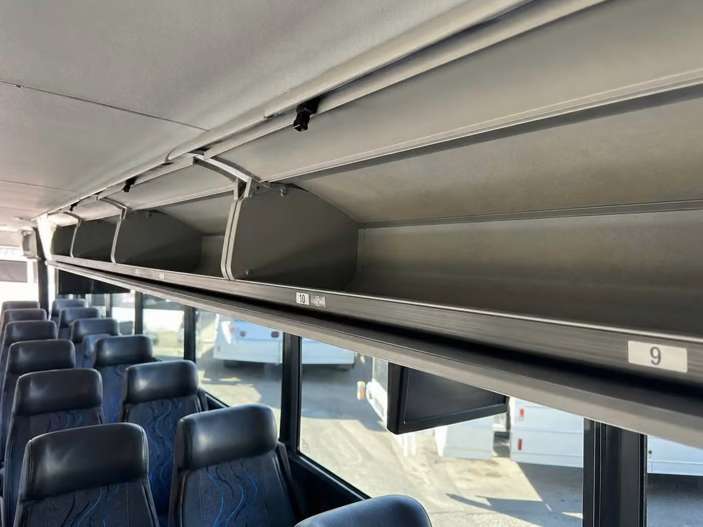 atwater 35 passenger minibus overhead storage