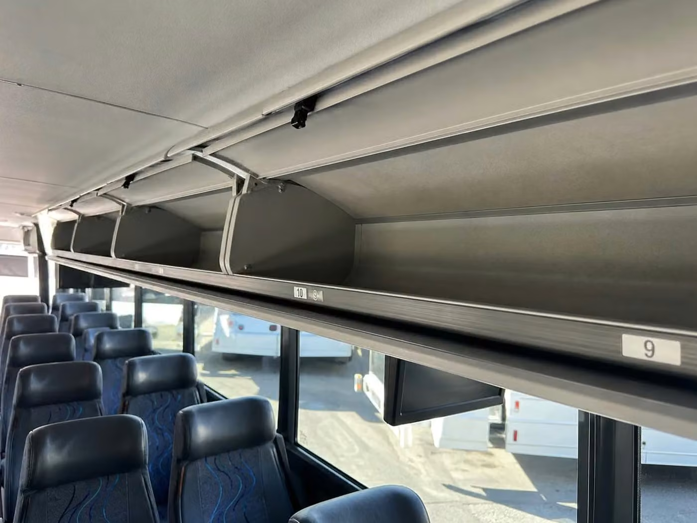 atwater charter bus overhead storage